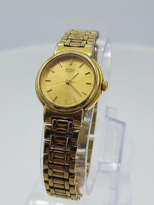 Seiko V401-0671 ladies watch stainless steel gold look V401-0671 analog 3 ATM